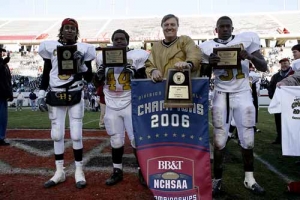 Coach Smith with Dee Bost, Mike Moore, and Calvin Hillie